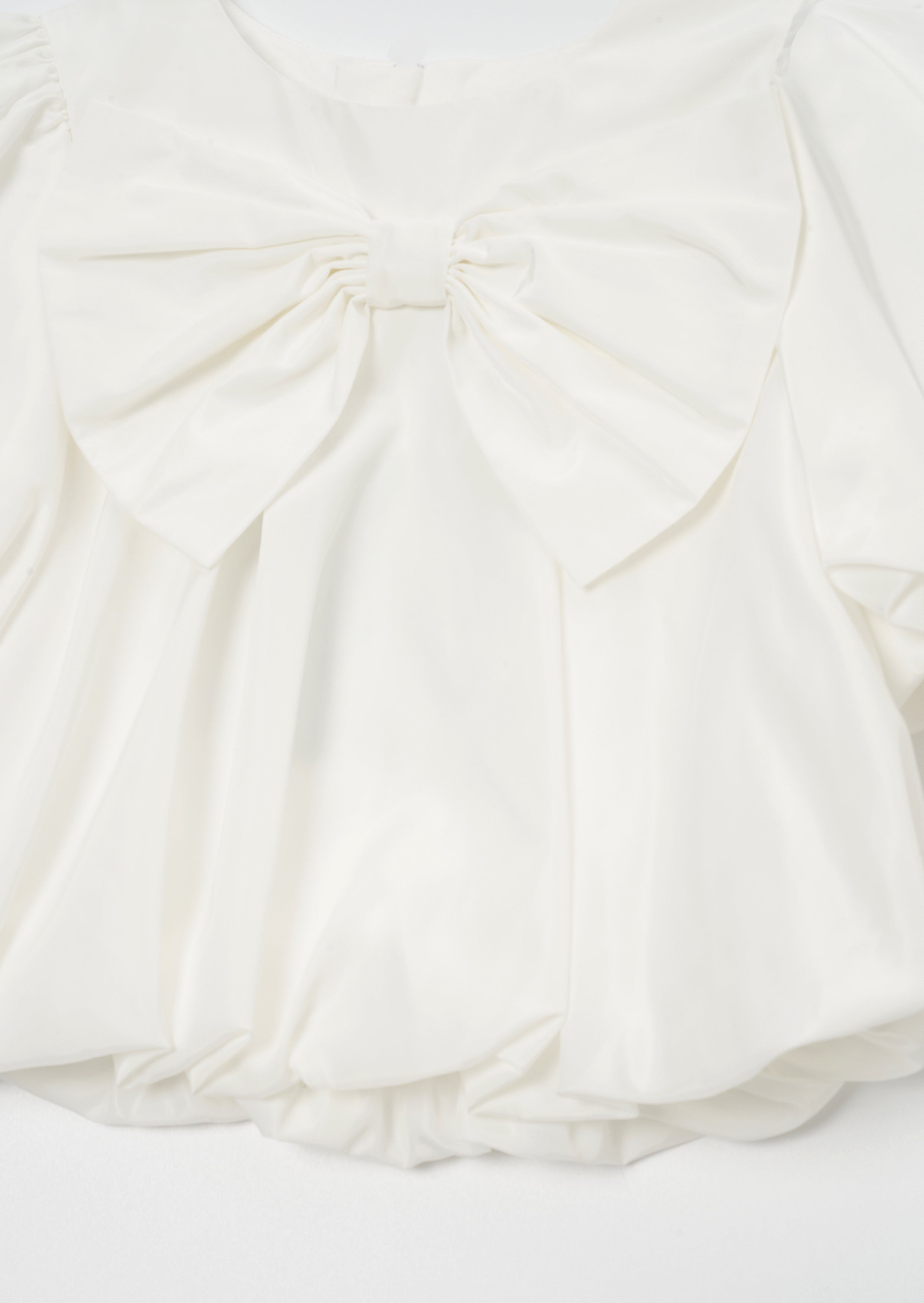 Nadia Ivory Bubble Hem Bow Top