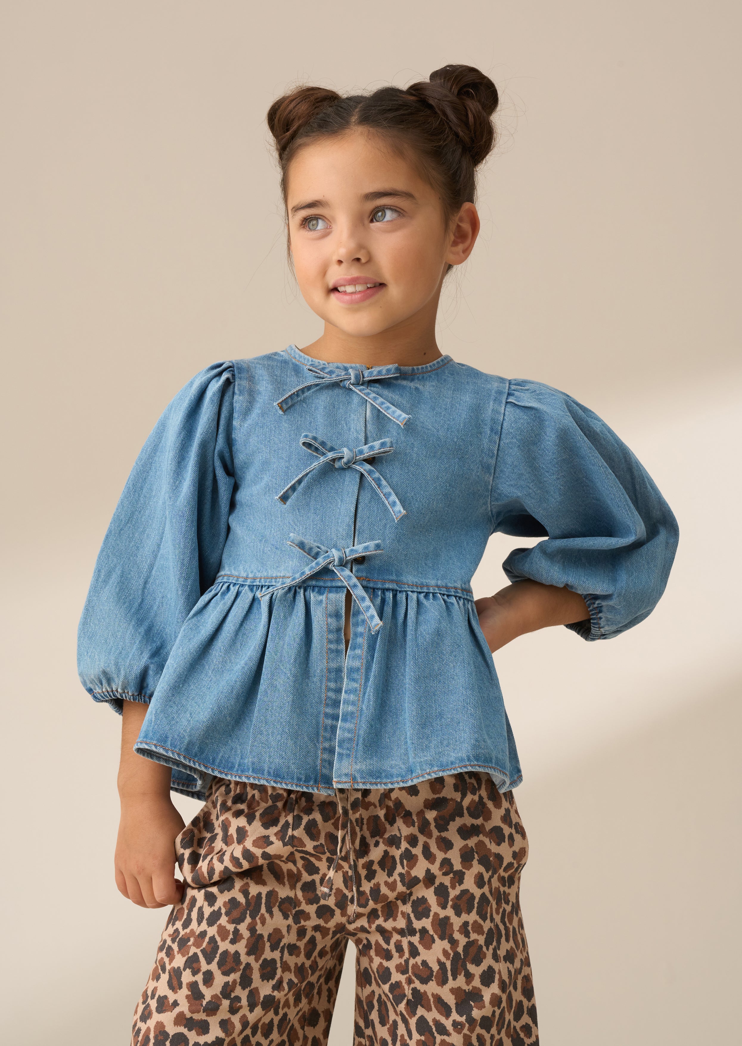 Rochelle Blue Denim Peplum Bow Top