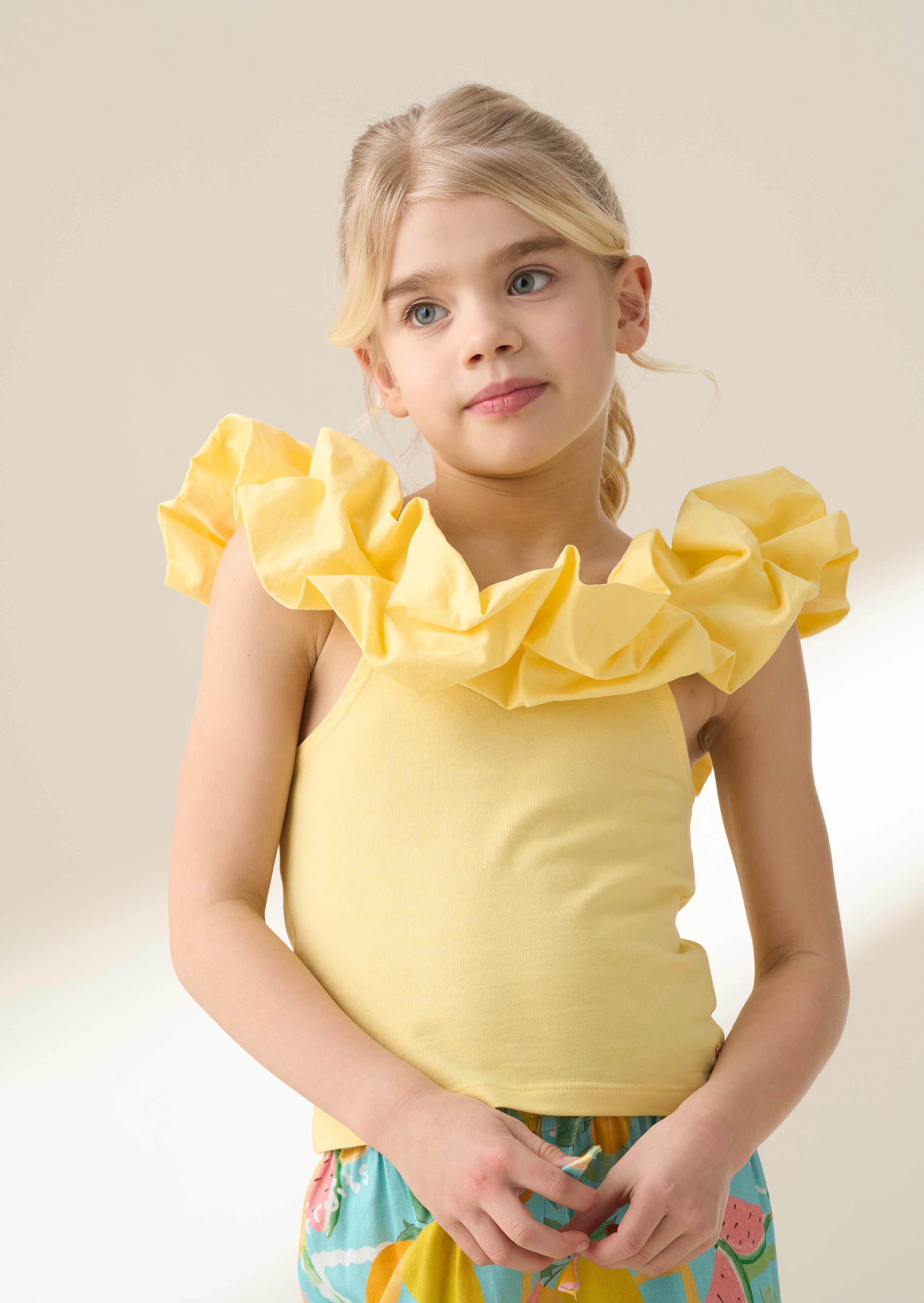 Carrie Yellow Ruffle Vest Top