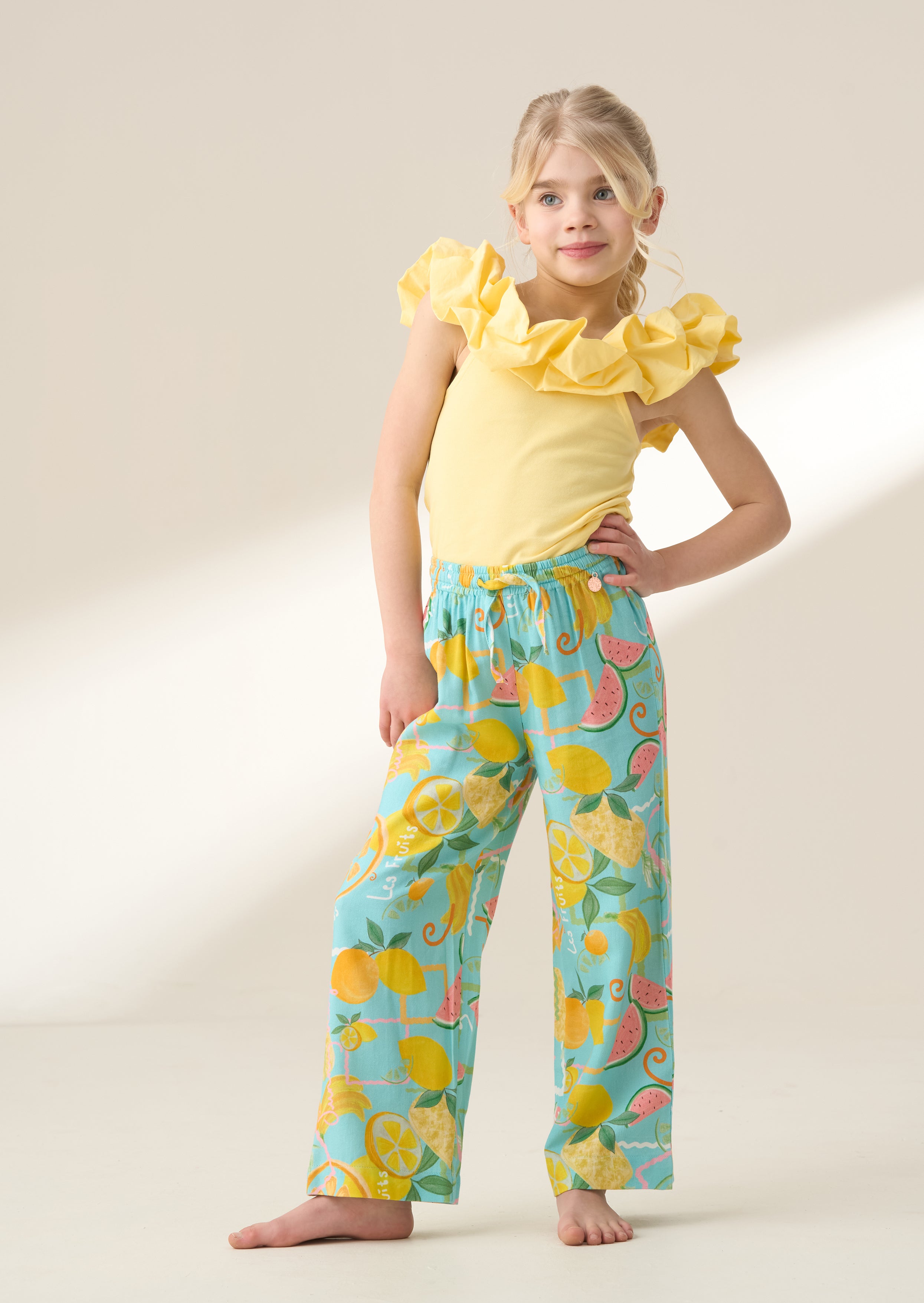 Lyla Blue Fruit Print Trousers